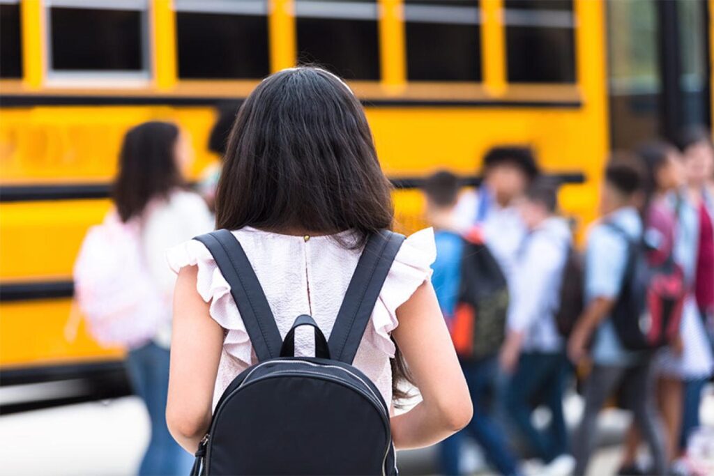 Girl with backpack Vitsaxaki